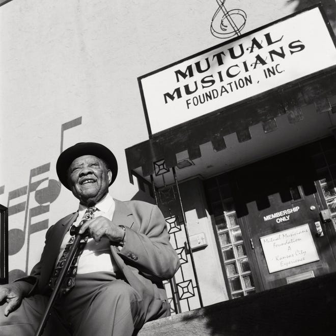 Swing bandleader Jay McShann is shown in Kansas City where he had established himself as a pivotal figure in the blues and hard bop jazz scene in the 1940s. He died in 2006 at age 90. Robillard says the photos in his show were taken between 1990 and 2005.