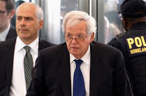 In this June 9, 2015 file photo, former U.S. House Speaker Dennis Hastert arrives at the federal courthouse in Chicago for his arraignment on federal charges in his hush-money case. A filing in Hastert's hush-money case confirms prosecutors intend to call at least one witness at the former U.S. House speaker's sentencing, though the order posted on Wednesday, March 23, 2016, by the presiding judge doesn't identify that witness. Hastert pleaded guilty to violating bank laws in seeking to pay $3.5 million in hush money to some referred to in the indictment only as "Individual A." Prosecutors have spoken before about giving victims closure but never identified any. (AP Photo/Charles Rex Arbogast, File)