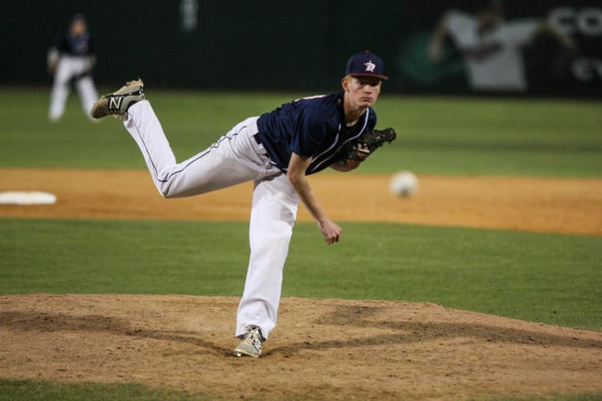 David McLeod pitches for DeLand against Lake Howell in DeLand on Wednesday. News-Journal/LOLA GOMEZ
