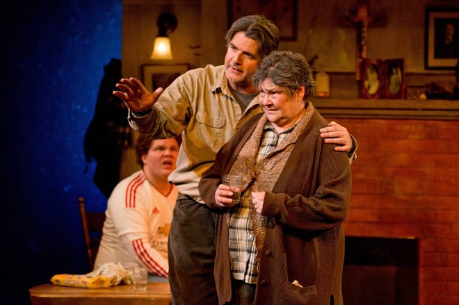 Jim O'Brien as Mick Dowd and Wendy Overly as Maryjohnny Rafferty in "A Skull in Connemara," at the Gamm Theatre through Sunday. In the background is Jonathan Fisher as Mairtin Hanlon. Peter Goldberg