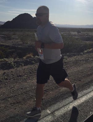 Barstow police Sgt. Chris Kirby competes in the annual Baker to Vegas Run on Saturday. Kirby was among the 10 participants in the 120-mile long race from the Barstow Police Department. Ten officers from the Marine Corps Logistics Base Police Department teamed with the BPD officers to finish the race in just over 20 hours. Courtesy photo