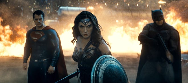 Superman (Henry Cavill, left) and Batman (Ben Affleck) are joined by Wonder Woman (Gal Gadot) in "Batman v Superman: Dawn of Justice." Warner Bros. Entertainment