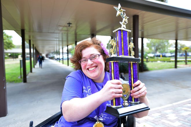 Gianna "Gigi" Gonzalez, 23, poses for a portrait outside of Lake-Sumter State College on Thursday. Gonzalez, who is wheelchair-bound from cerebral palsy, recently won second place in the Ms. Wheelchair Florida 2016 pageant.