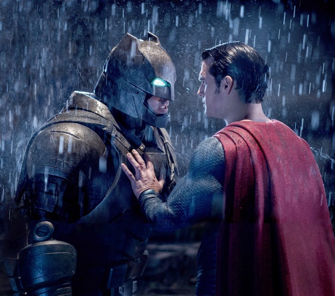 Ben Affleck as Batman and Henry Cavill as Superman in "Batman v Superman: Dawn of Justice." MUST CREDIT: Clay Enos, Warner Bros. Pictures)
