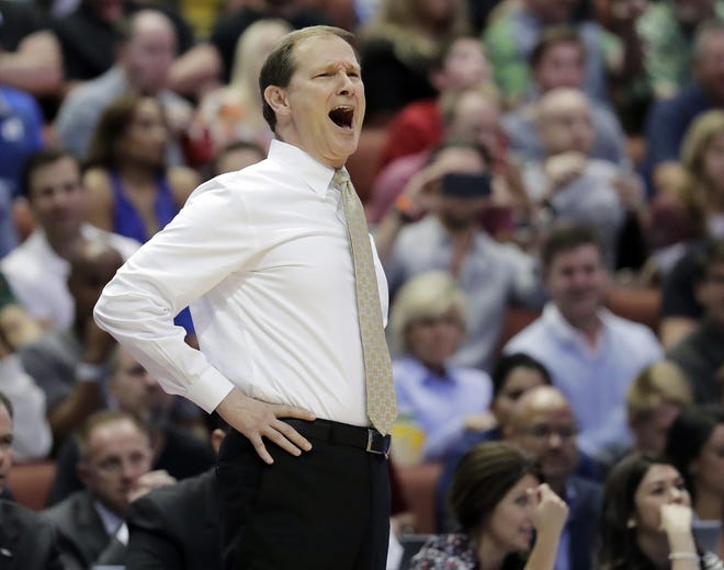 Oregon head coach Dana Altman, left, and Oklahoma counterpart Lon Kruger have been friends for three decades. Their teams face each other on Saturday with a Final Four bid at stake. Associated Press photos