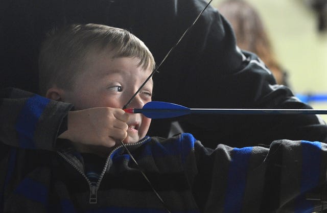BRIAN D. SANDERFORD • TIMES RECORD
Thomas Griffith, 6, of Coal Hill launches an arrow for the first time during an archery program at the Janet Huckabee Arkansas River Valley Nature Center on Thursday, March 24, 2016. Thomas attended the program with his parents, Nathan and Michelle Griffith. Spring Break events continue today at the center with a t-shirt bleaching make-and-take class at 10 a.m. Participants are asked to bring dark-colored shirts.