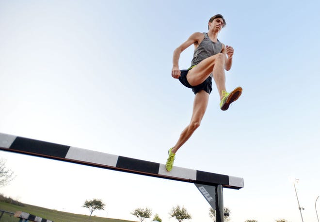 Potential Olympian Mark Parrish trains at the National Training Center track on Tuesday in Clermont. Parrish is trying out for the opportunity to represent the U.S.A. in the steeplechase at the Olympics.