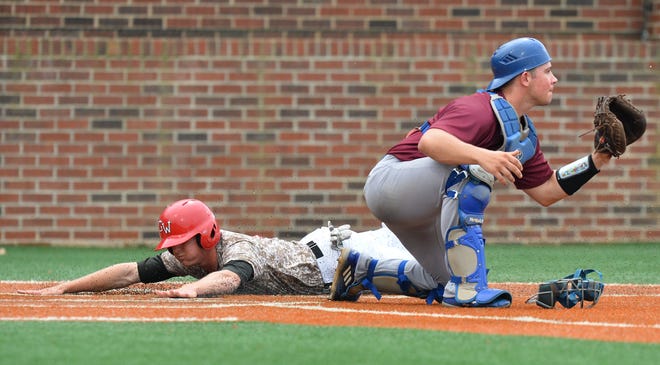 GWU baserunner Chris Clary beats the throw to Presbyterian catcher Rob Koski for an insurance run in the eighth inning of the Runnin' Bulldogs 3-1 Big South Conference win in Boiling Springs. (Tim Cowie/GWU Athletics)