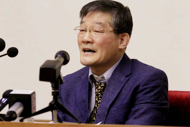 Kim Tong Chol, a U.S. citizen detained in North Korea, speaks as he is presented to reporters in Pyongyang, North Korea on Friday, March 25, 2016. North Korea presented another American detainee before the media on Friday, nine days after it sentenced a U.S. tourist to 15 years in prison with hard labor for subversion. Kim told in Pyongyang that he had collaborated with and spied for South Korean intelligence authorities in a plot to bring down the North's leadership and tried to spread religious ideas among North Koreans. (AP Photo/Kim Kwang Hyon)
