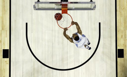 North Carolina's Brice Johnson dunks during the second half of a Sweet 16 win against Indiana.