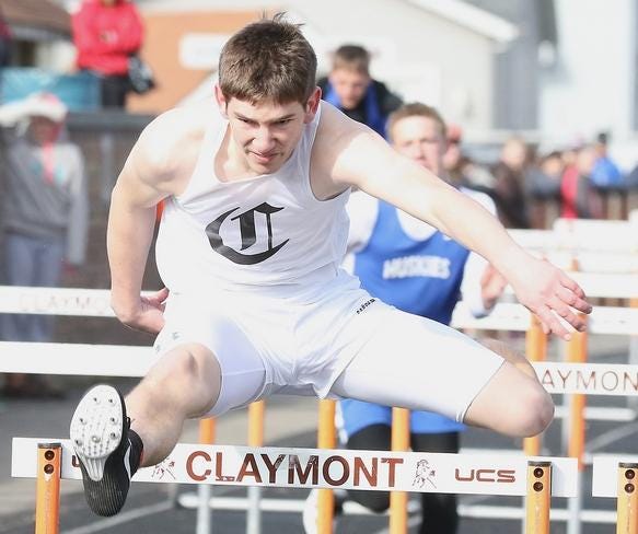 Claymont's Brian Ruffini clears the last hurdle to finish first in the boys 110 meter hurdles at the Jeff Arthurs Invitational Track and Field Meet Saturday.