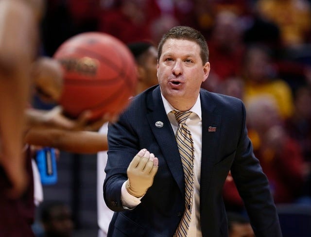 Arkansas Little Rock Trojans head coach Chris Beard talks to one of his players from courtside in the first half during Purdue versus Arkansas Little Rock in the first round of the 2016 NCAA Tournament at Pepsi Center in Denver on Thursday, March 17, 2016. (Isaiah J. Downing-USA TODAY Sports)