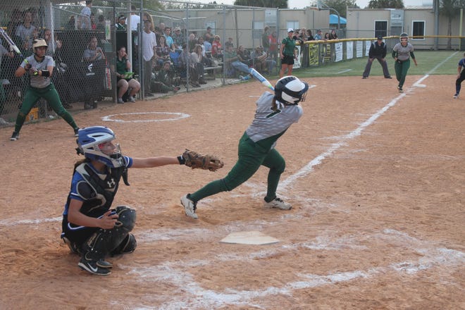 Juliana Savone slaps a 2-run double in the first inning for FPC. NEWS-TRIBUNE PHOTOS/ANDY MIKULA