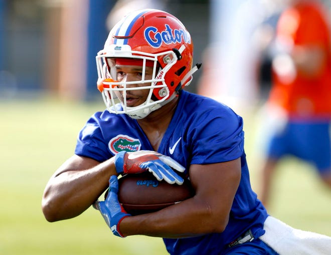 Florida running back Mark Herndon goes through a drill at practice earlier this month.