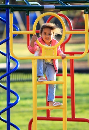 Jamie Mitchell • Times Record Mya Youngblood finds a new adventure, Monday, March 28, 2016, playing in the Tilles Park. Mya is the 4-year-old daughter of Kayla Edwards and Clayton Bray.