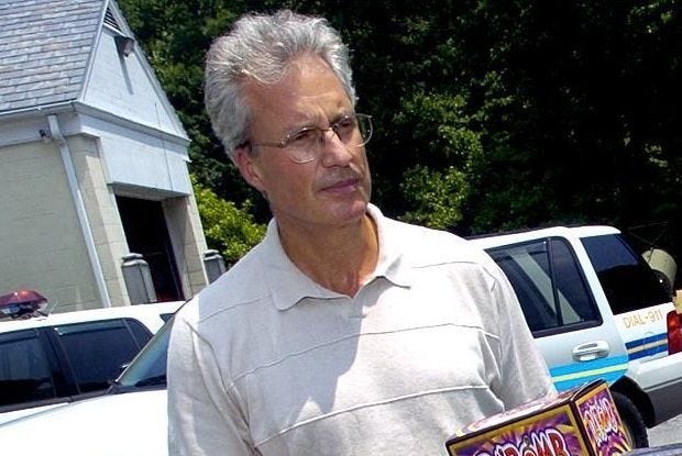 (File) Then-Detective Roy Ferrari talks about fireworks outside the Solebury police department building in this 2004 photo. Ferrari resigned from the force and later admitted to theft and evidence-tampering charges. On March 30, 2016, Ferrari was sentenced to three to 23 months in Bucks County Prison.