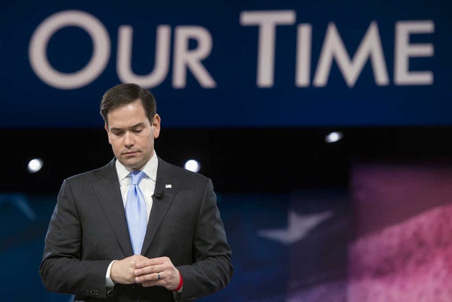 Republican presidential candidate, Sen. Marco Rubio, R-Fla. pauses while addressing the American Conservative Union's Conservative Political Action Conference (CPAC) in National Harbor, Md., Saturday, March 5, 2016. (AP Photo/Cliff Owen)