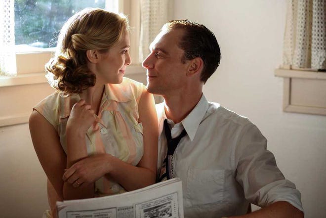 This image released by Sony Pictures Classics shows Elizabeth Olsen as Audrey Williams, left, and Tom Hiddleston as Hank Williams in a scene from, "I Saw The Light." (Sam Emerson/Sony Pictures Classics via AP)