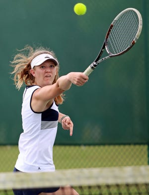 McKeel sophomore Hannah Hogg hits a backhand volley during her No. 1 singles final match against Hardee's Abby Clark on Thursday morning in the Class 2A, District 9 tennis tournament in Lake Wales.