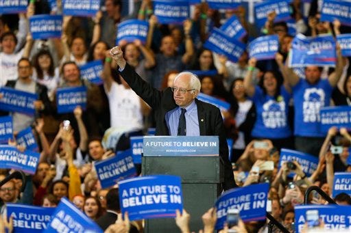 Democratic presidential candidate, Sen. Bernie Sanders, I-Vt, gestures to the crowd at a campaign stop, Thursday, March 31, 2016, in Pittsburgh. (AP Photo/Keith Srakocic)