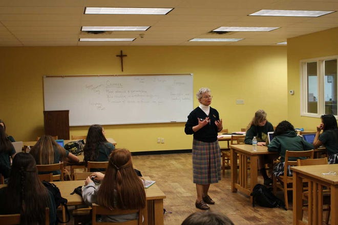 Sister Suzan Foster instructs students at the Cathedral Parish School in this 2015 file photo.