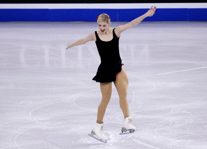 Gracie Gold, of the United States, completes her routine during the women's short program in the World Figure Skating Championships, Wednesday, March 31, 2016, in Boston. (AP Photo/Elise Amendola)