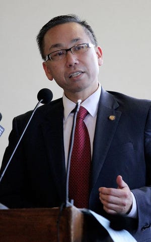 Cranston Mayor Allan Fung delivers his proposed $275-million city budget to the City Council on Friday.