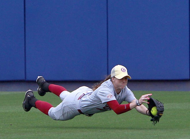 Alabama Crimson Tide outfielder Kallie Case makes a diving catch against the Florida Gators on Saturday, April 2, 2016 in Gainesville, Fla. Florida defeated Alabama 3-2 to even the series at one a piece.