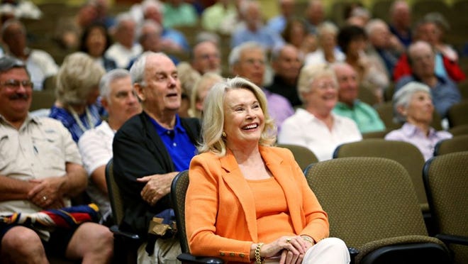 Nancy McDonald, of West Palm Beach, listens to James Bruce’s presentation on U.S. counterintelligence in the Lifelong Learning Society at Florida Atlantic University’s John D. MacArthur campus in Jupiter on March 29, 2016. (Richard Graulich / The Palm Beach Post)