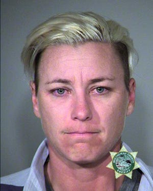 This undated photo provided by Multnomah County Sheriff's Office shows retired World Cup soccer champion Abby Wambach. Portland police Sgt. Peter Simpson said in a statement Sunday, April 3, 2016, that Wambach was stopped Saturday in Portland, Ore., and arrested for investigation of driving under the influence. (Multnomah County Sheriff's Office via AP)