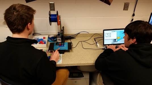 Students use a 3-D printer in the Cleveland County Schools’ makerspace, which was supported by a $5,000 grant from the PPG Foundation. Special to The Star
