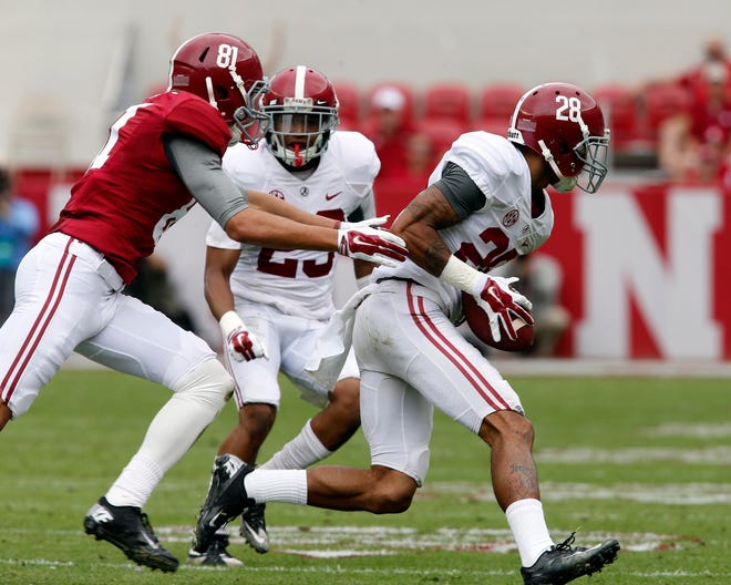 Alabama defensive back Anthony Averett (28) carries the ball in the third quarter during A-Day at Bryant-Denny Stadium in Tuscaloosa, Ala. on Saturday April 18, 2015. staff photo file Robert Sutton