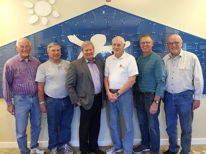 John Cleary and friends help the children at CIC in several ways. Pictured (from left) are snowbirds Allen Schelfhout, Dave Smith, Ken Hair, CIC president/CEO, John Cleary, Bob Patoka and Ken Schelfhout.