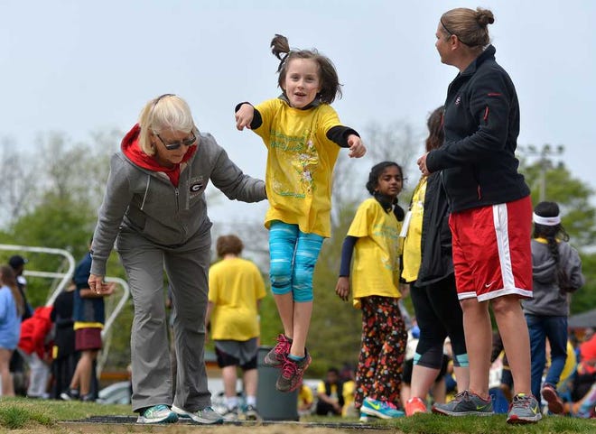 Timothy Road Elementary student Pearl Choate competes in the standing long jump during the Special Olympics at Clarke Central High School on Wednesday, April 6, 2016 in Athens, Ga. (Richard Hamm/Staff) OnlineAthens / Athens Banner-Herald