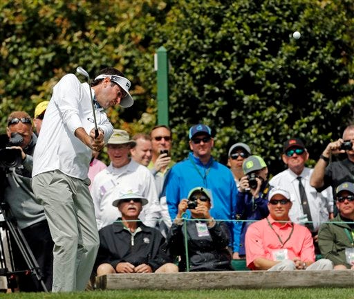 Bubba Watson tees off on the first hole during a practice round for the Masters golf tournament Wednesday, April 6, 2016, in Augusta, Ga. (AP Photo/Chris Carlson)