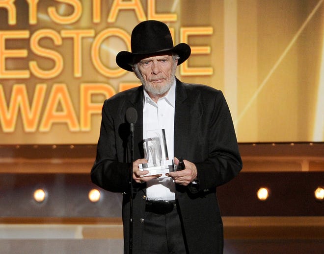 Merle Haggard accepts the crystal milestone award in April 2014 at the 49th annual Academy of Country Music Awards in Las Vegas. Haggard died of pneumonia Wednesday, April 6, 2016, in Palo Cedro, Calif. He was 79. Photo by Chris Pizzello/Invision/AP, File