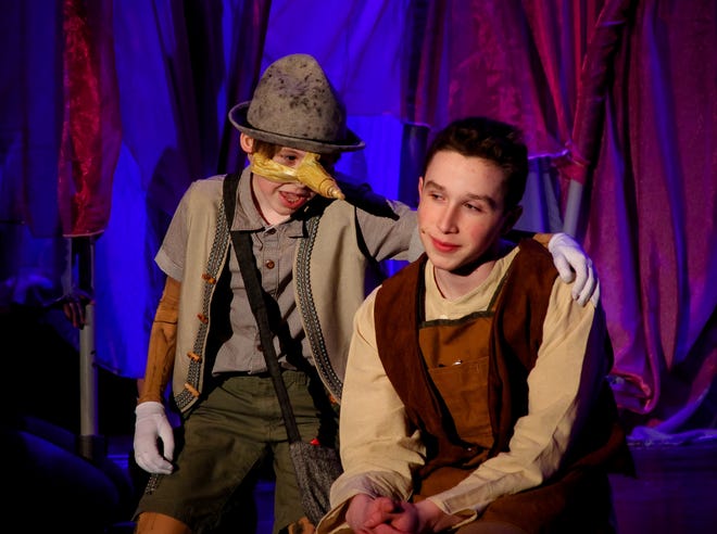 Indiana Wormstead as Pinocchio and Alex Lomartire as Geppetto talk inside the whale's mouth Tuesday afternoon during the Dover Middle School dress rehearsal for "My Son Pinocchio Jr." in the high school auditorium. The show runs Thursday through Sunday at Dover High School. Photo by Shawn St.Hilaire/Fosters.com