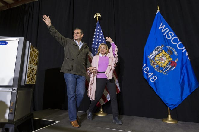 FILE - In this March 24, 2016 file photo, Republican presidential candidate, Sen. Ted Cruz, R-Texas and wife Heidi walk on stage before the candidate spoke at a campaign stop in Dane, Wis. Cruz accused Republican presidential rival Donald Trump of stoking false rumors about his personal life on Friday, March 25, 2016, charging that the billionaire businessman and GOP front-runner is trafficking in ìsleazeî and ìslime.î(AP Photo/Andy Manis, File)