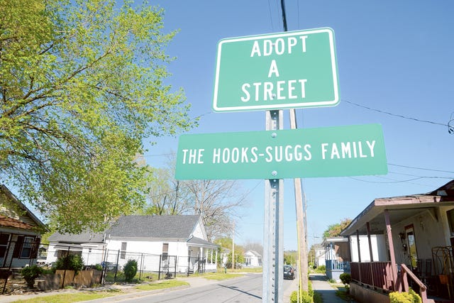 This ‘adopt a street’ sign is posted near the empty lot at Chestnut Street and Martin Luther King Jr., Boulevard, which will be used by Kinston Teens for a vision garden.
