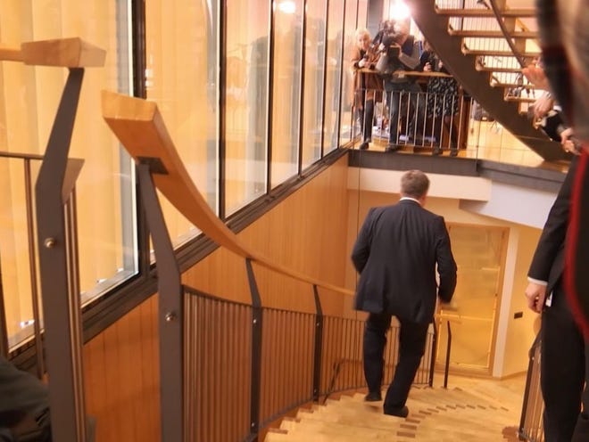 In this image taken from video, Iceland Prime Minister Sigmundur David Gunnlaugsson leaves Parliament in Reykjavik on Tuesday after holding a meeting. Gunnlaugsson resigned amid a controversy over his offshore holdings.