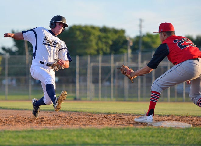 Eustis' Kerry Carpenter slides into third while South Sumter's Cinto Arredondo (25) looks to tag him out during Friday's game at Stuart Cottrell Field in Eustis.