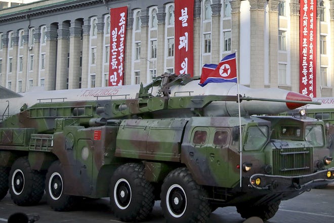 FILE - In this Saturday, Oct. 10, 2015, file photo, what is believed to be an improved version of the KN-08 intercontinental ballistic missile is paraded in Pyongyang, North Korea, during the 70th anniversary celebrations of its ruling party's creation. North Korea said Saturday, April 9, 2016, it has successfully tested a new intercontinental ballistic rocket engine that will give it the ability to stage nuclear strikes on the United States. (AP Photo/Wong Maye-E, File)