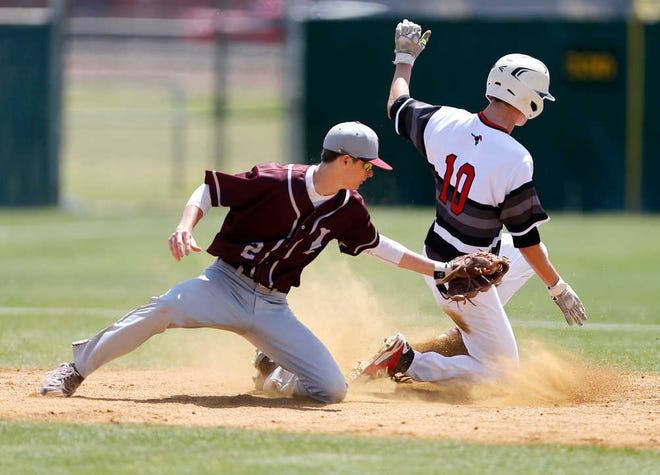 Shallowater's (10) Tyler Simons slides safely into second base under the tag of Littlefield's second baseman in the bottom of the 3rd inning. Shallowater High School hosted Lubbock Littlefield High School baseball Saturday, Apr 9, 2016, in Shallowater, Texas. (Mark Rogers/AJ Media)