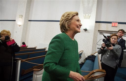 Democratic presidential candidate Hillary Clinton exits after speaking at New Greater Bethel Ministries during a campaign stop, Sunday, April, 10, 2016, in New York. (AP Photo/Bryan R. Smith)