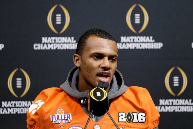 FILE - In this Jan. 9, 2016, file photo, Clemson quarterback Deshaun Watson talks during media day for the NCAA College Football Playoff National Championship in Phoenix. At first, most early enrollees were quarterbacks. No position requires more mental preparation. Watson had to give up a final season of high school basketball, but knew football was his future. (AP Photo/David J. Phillip, File)