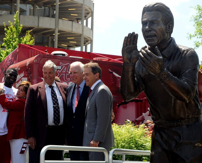 4/16/11 - Tuscaloosa, AL - Head coach Nick Saban poses with former head coach Gene Stallings and athletics director Mal Moore during the Nick Saban statue unveiling at the University of Alabama Saturday April 16, 2011. (Jason Harless / The Tuscaloosa News)