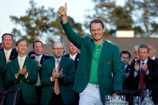 Masters champion Danny Willett gives a thumbs up after winning the Masters on Sunday in Augusta, Ga. (AP Photo/Jae C. Hong)