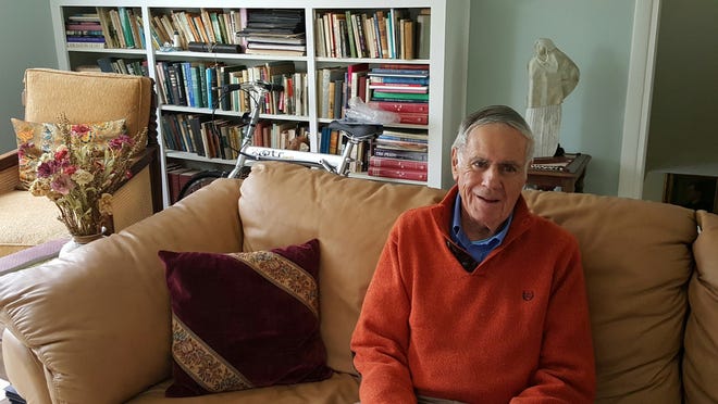 Author and historian Neil Rolde in his York home. At 85, Rolde has just published his 15th book, a fictional account of a Nazi atrocity in France during WWII. He is also working on books two and three of a trilogy about Jewish immigration to American and Israel. Deborah McDermott photo