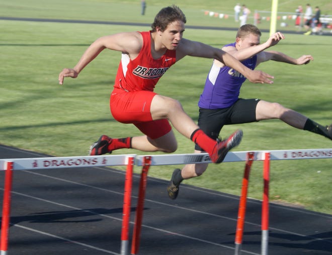 Pekin’s Connor Eubanks jumps over a hurdle during Tuesday afternoon's Mid-Illini Conference triangular track meet. Eubanks won the 110 meter high hurdle with a time of 16.8 seconds.
