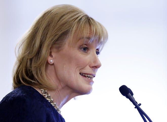 Gov. Maggie Hassan delivers the State of the State address in Concord, N.H., on Feb. 4. Investigations into sexual misconduct by faculty at a renowned New Hampshire prep school have found their way into Hassan's race against incumbent Republican Sen. Kelly Ayotte. (AP Photo/Jim Cole, File)